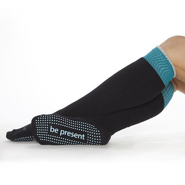 http://www.simplyworkout.com/cdn/shop/products/Sticky-Be-Knee-High-Grip-Socks-Be-Present_4.jpg?v=1624552936