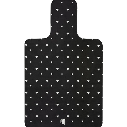 Black reformer mat with white heart pattern on a white background