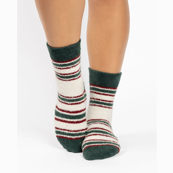 Striped socks with green, red, and white pattern on a white background