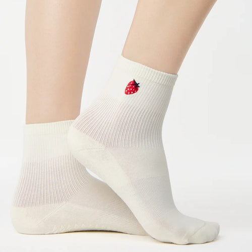 White socks with a strawberry design on a white background