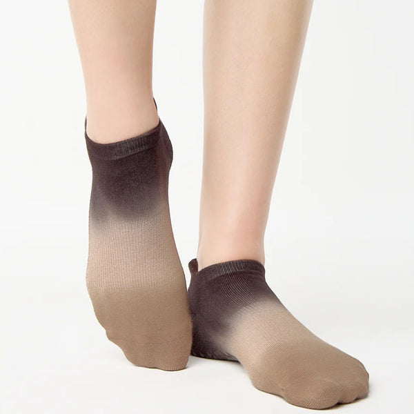 Ombre socks with brown to beige gradient on a white background
