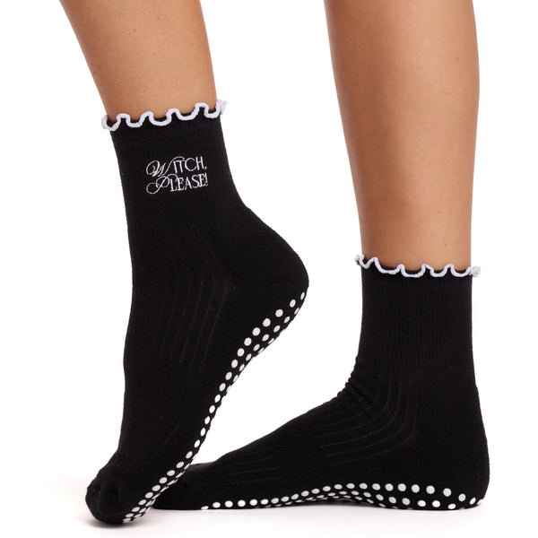 Black socks with white text and sole pattern on a white background