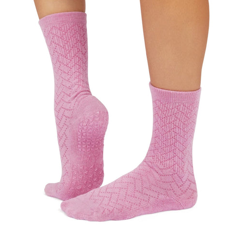Pink textured socks on a white background