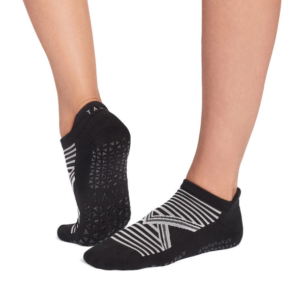 Black socks with white patterns on a white background
