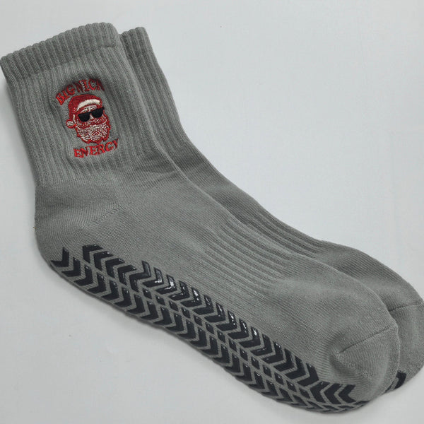 Gray sock with a red logo on a light gray background